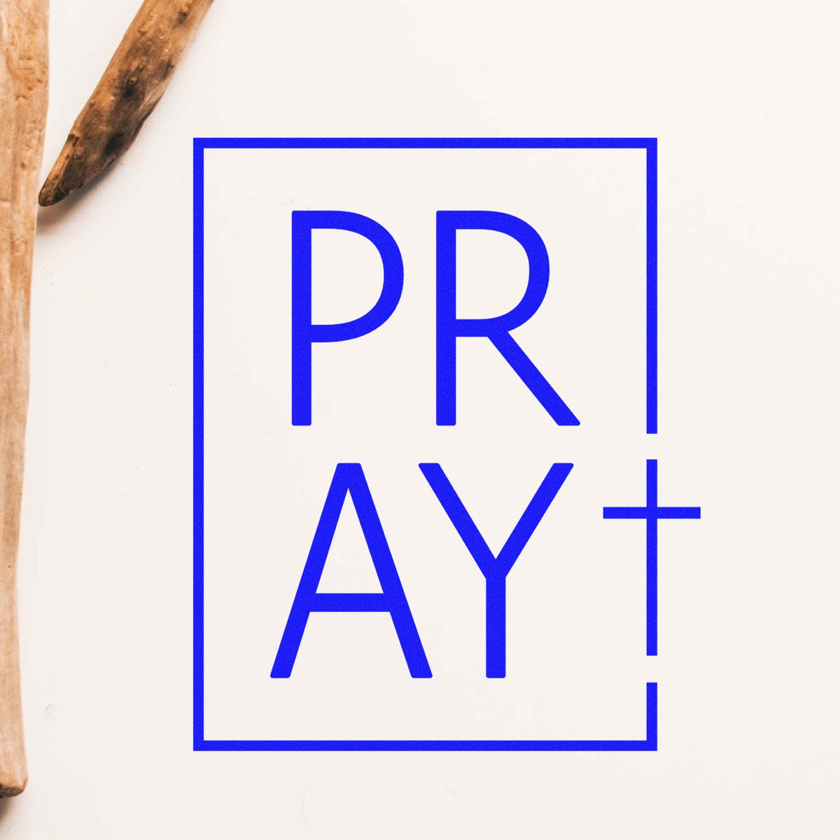 Blue PRAY rubber stamp design with cross in a square frame for faith-based stationery, cards, and craft projects.