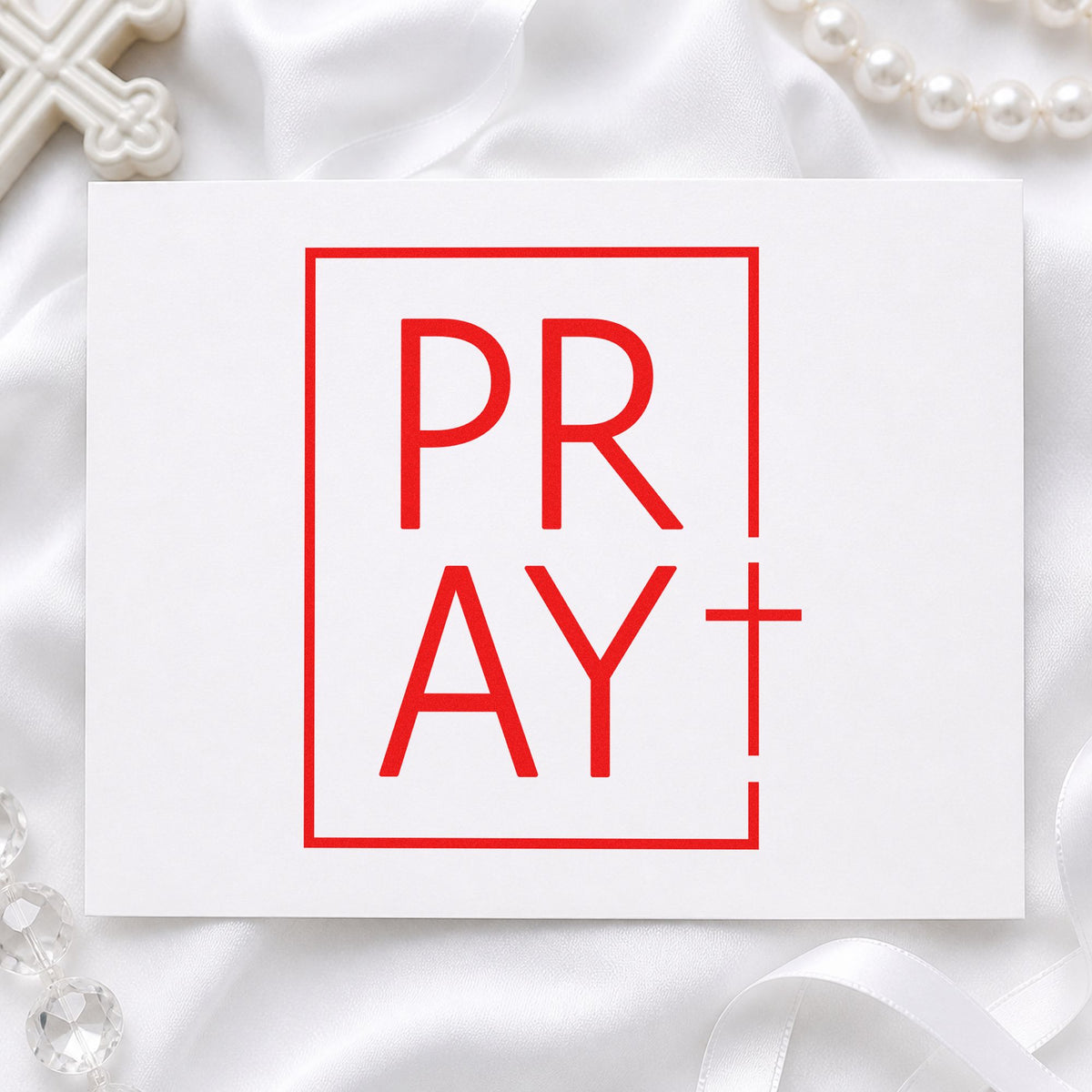 Pray Minimal Cross rubber stamp shown in red ink, stamped for projects such as journal spine labels.