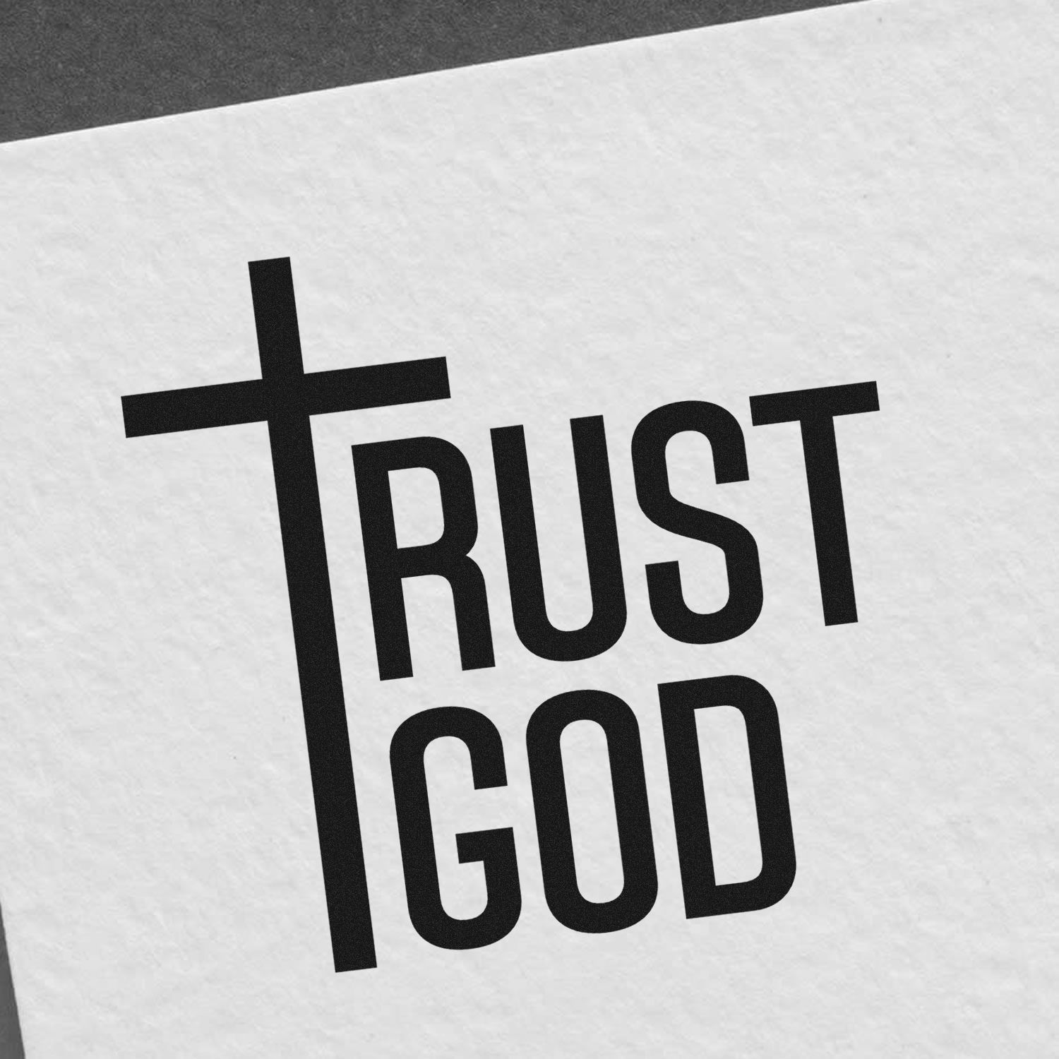 Trust God Christian rubber stamp design with cross-shaped lettering for faith-based crafts, cards, and stationery.