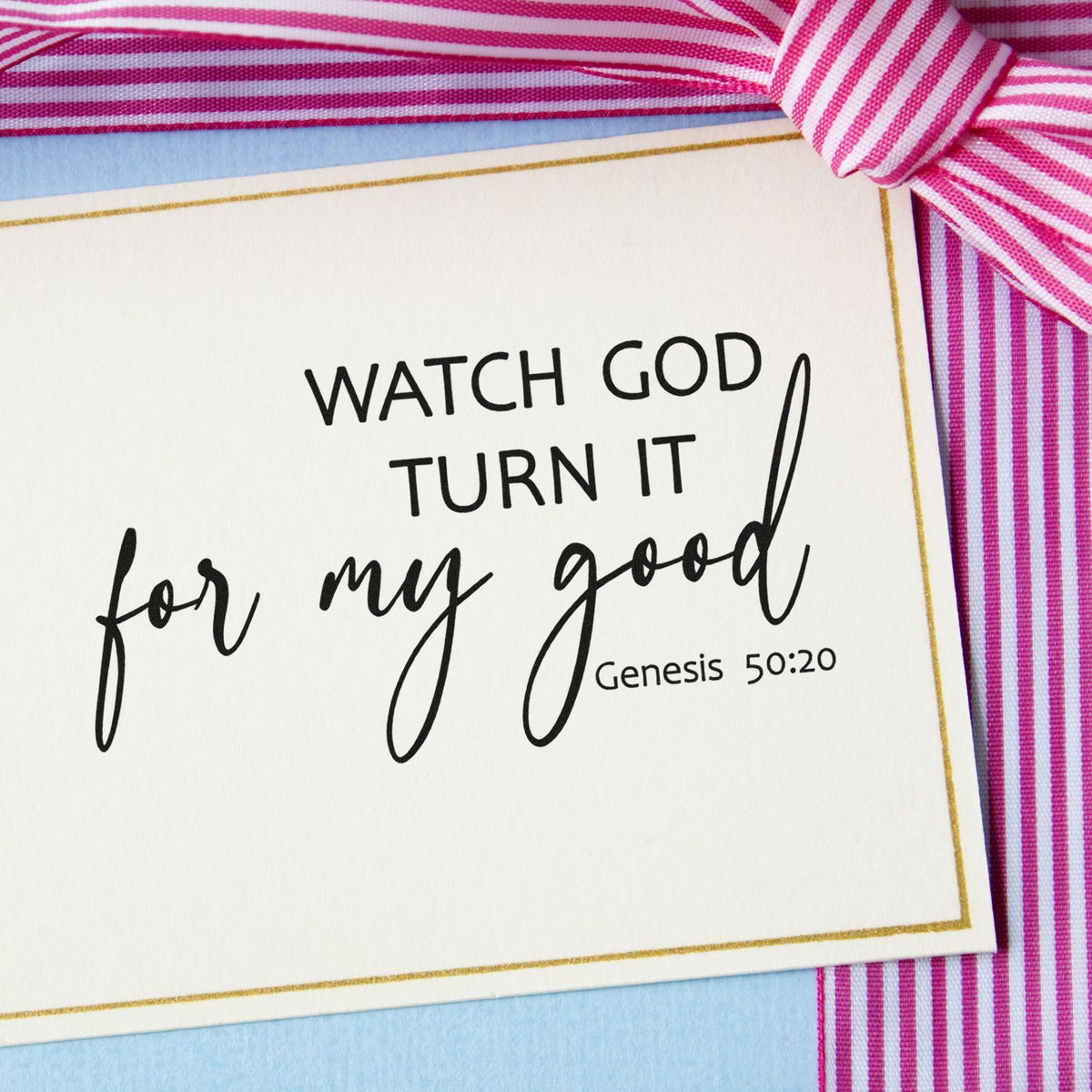 Christian scripture rubber stamp design reading Watch God turn it for my good with Genesis 50:20 on a ribbon-tied card.