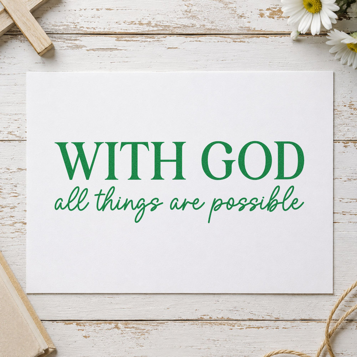 With God All Things Are Possible craft stamp imprint in green ink on a handmade project, one idea being framed nursery art.
