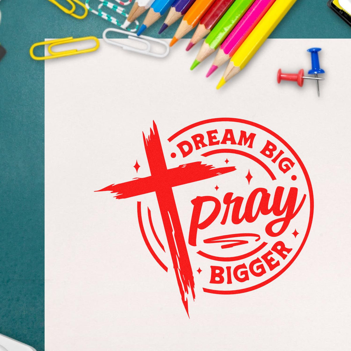 Inspirational rubber stamp design with red Dream Big Pray Bigger text, ideal for faith-based crafts, planners, and stationery.