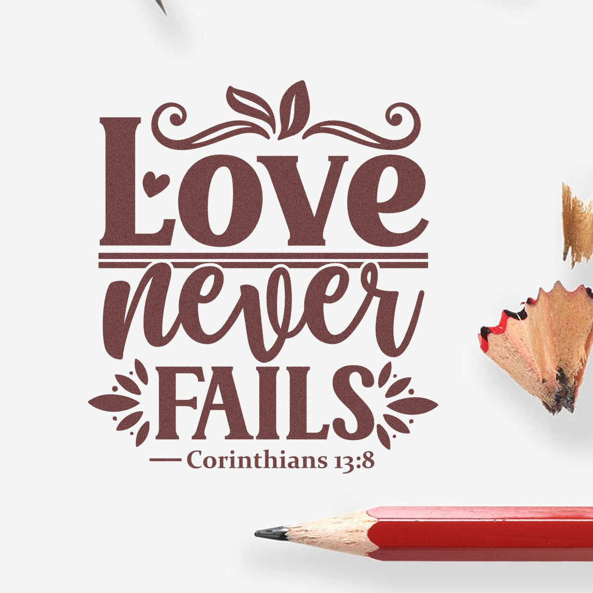 Love Never Fails Corinthians 13:8 decorative rubber stamp design for faith-based crafts, cards, and weddings.