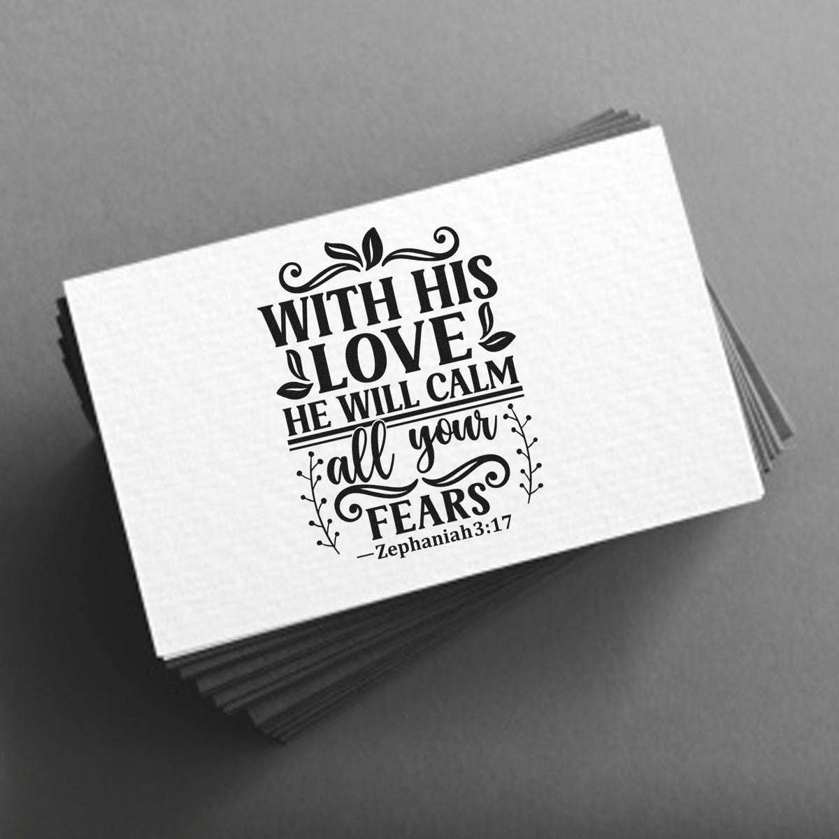 Christian rubber stamp design with Zephaniah 3:17 verse: With His Love He Will Calm All Your Fears.
