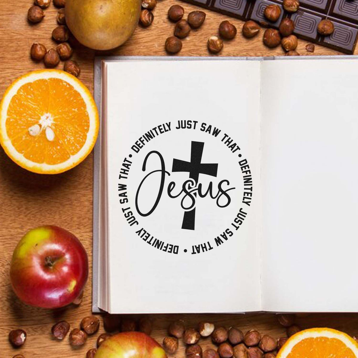 Faith-based rubber stamp design with Jesus cross and Definitely Just Saw That in a journal, styled for Christian crafting.