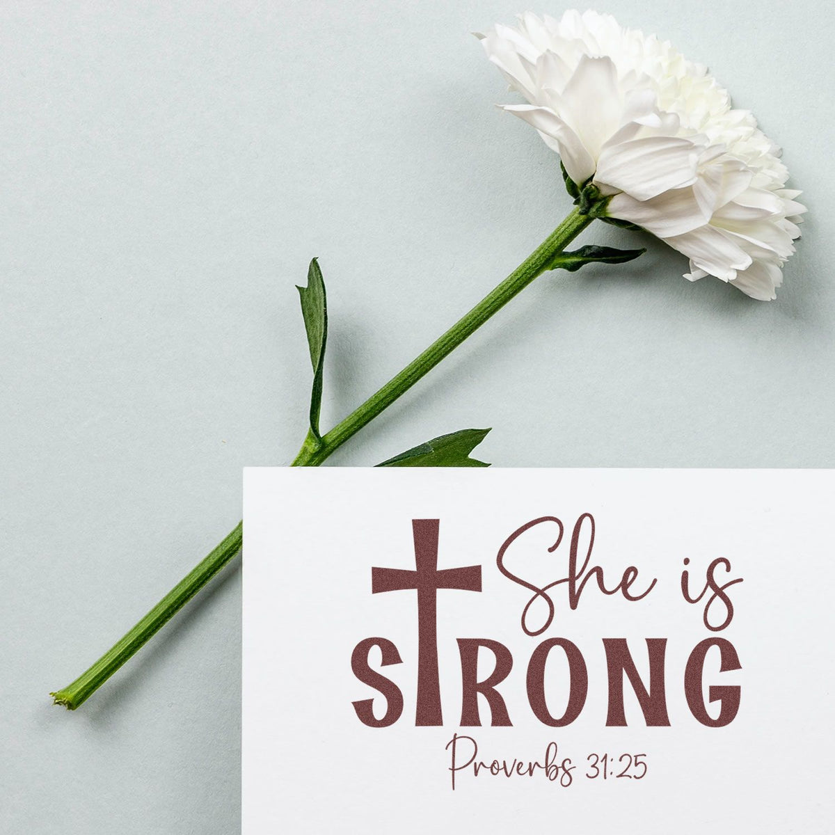 She Is Strong Proverbs 31:25 Christian rubber stamp design on card with white flower