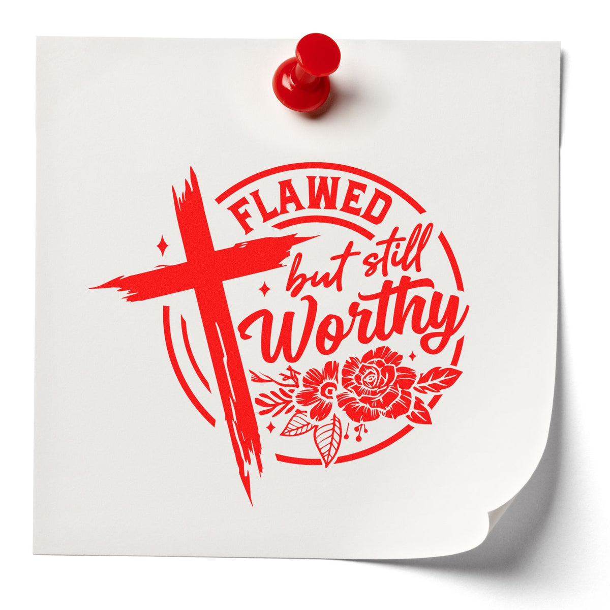 Red rubber stamp design with cross and floral accents reading Flawed but Still Worthy on white paper.