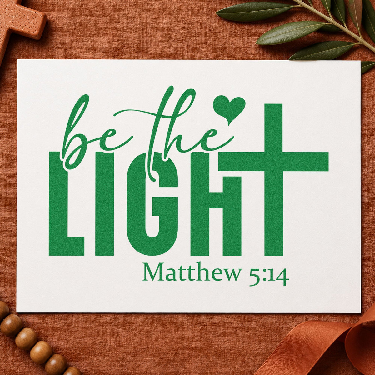 Be the Light craft stamp imprint in green ink on a handmade project, one idea being mentor thank-yous.
