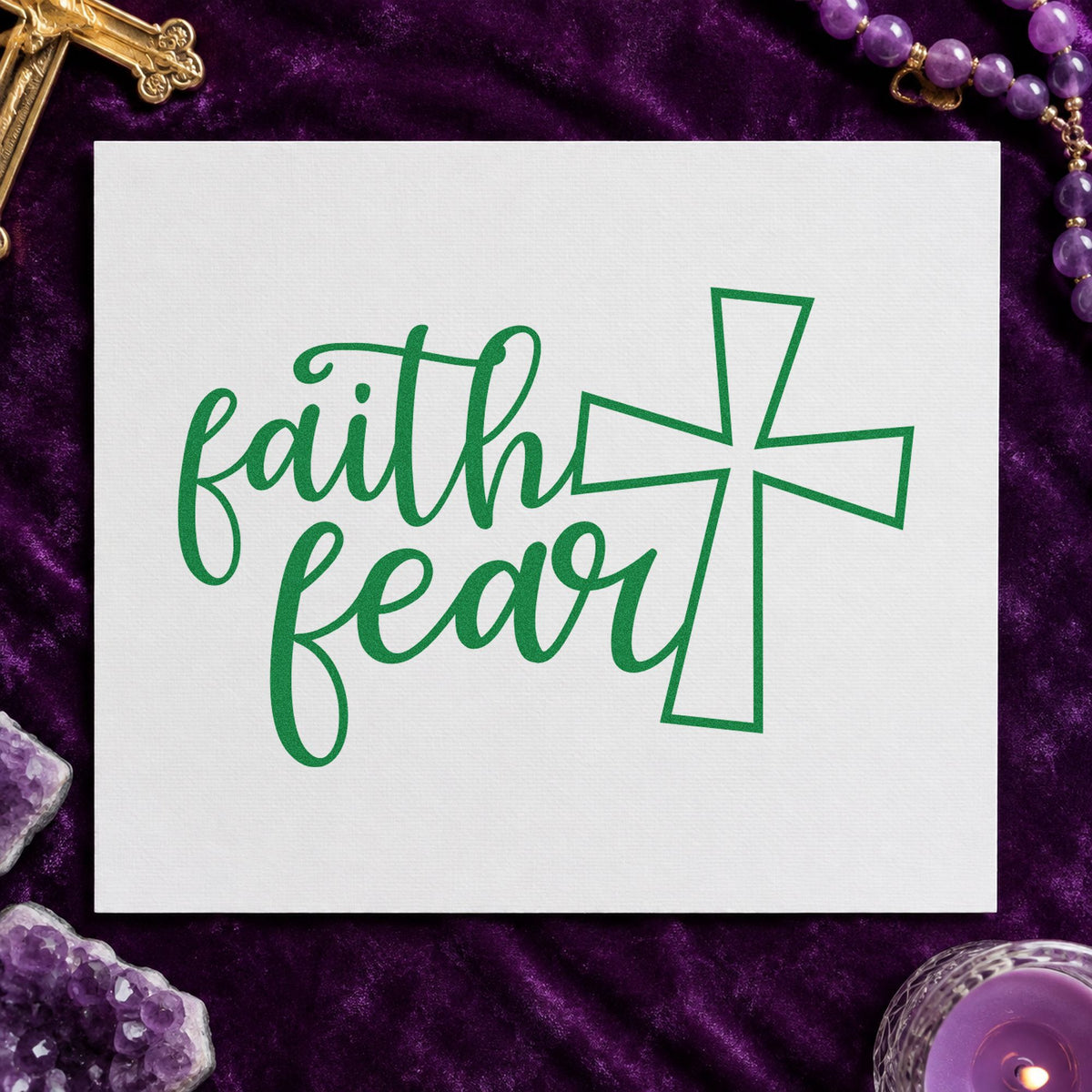 Faith over Fear Cross craft stamp imprint in green ink on a handmade project, one idea being decision journals.