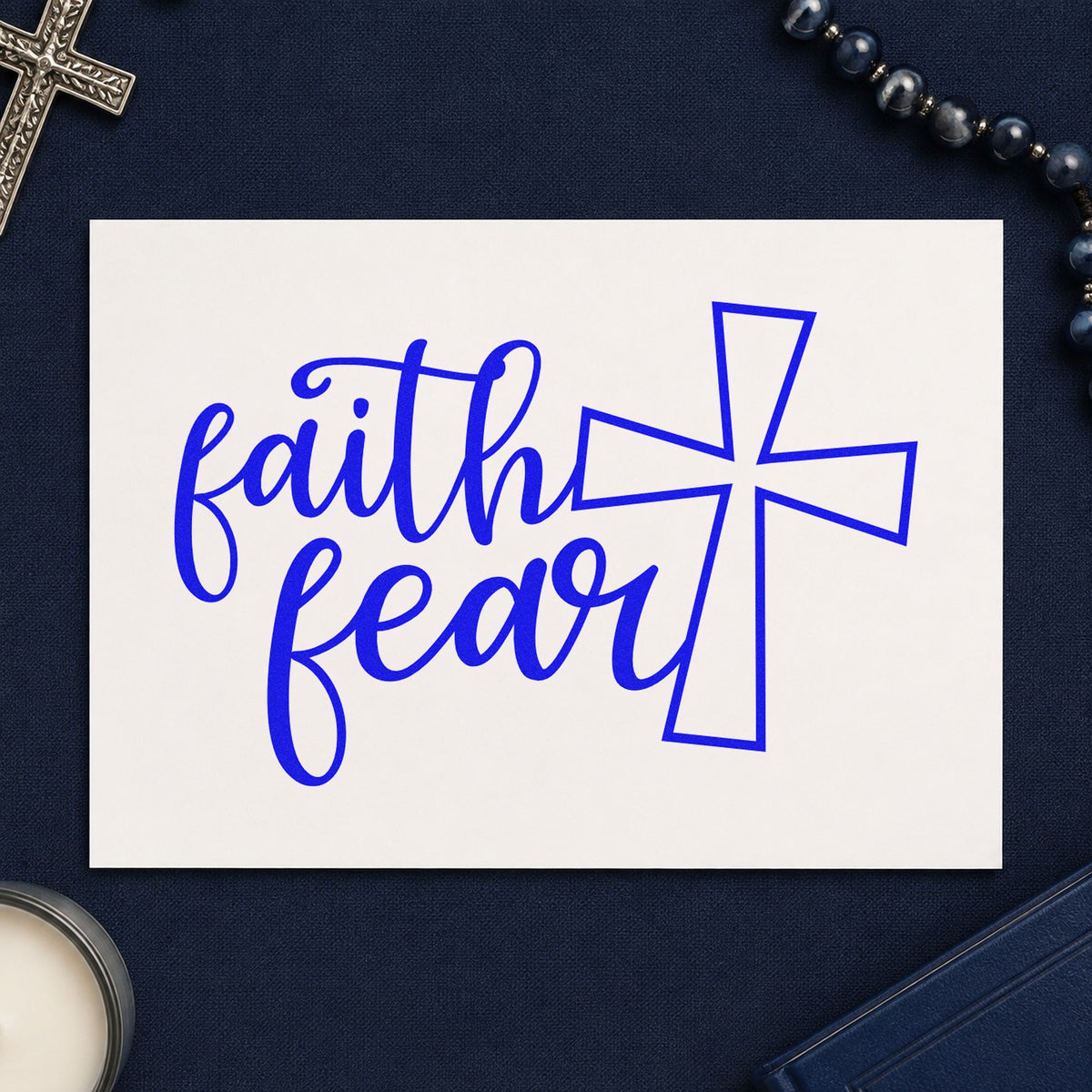 Faith over Fear Cross craft stamp imprinted in blue ink on paper, a design suited to hallway wall art.