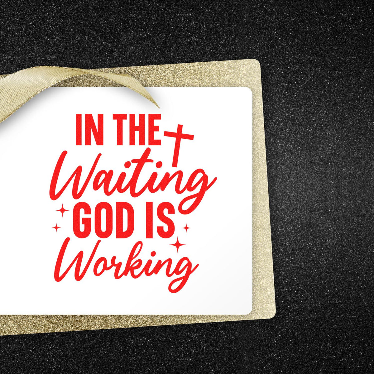 Christian rubber stamp design with In the Waiting God Is Working faith quote in red on a gold glitter card with ribbon.