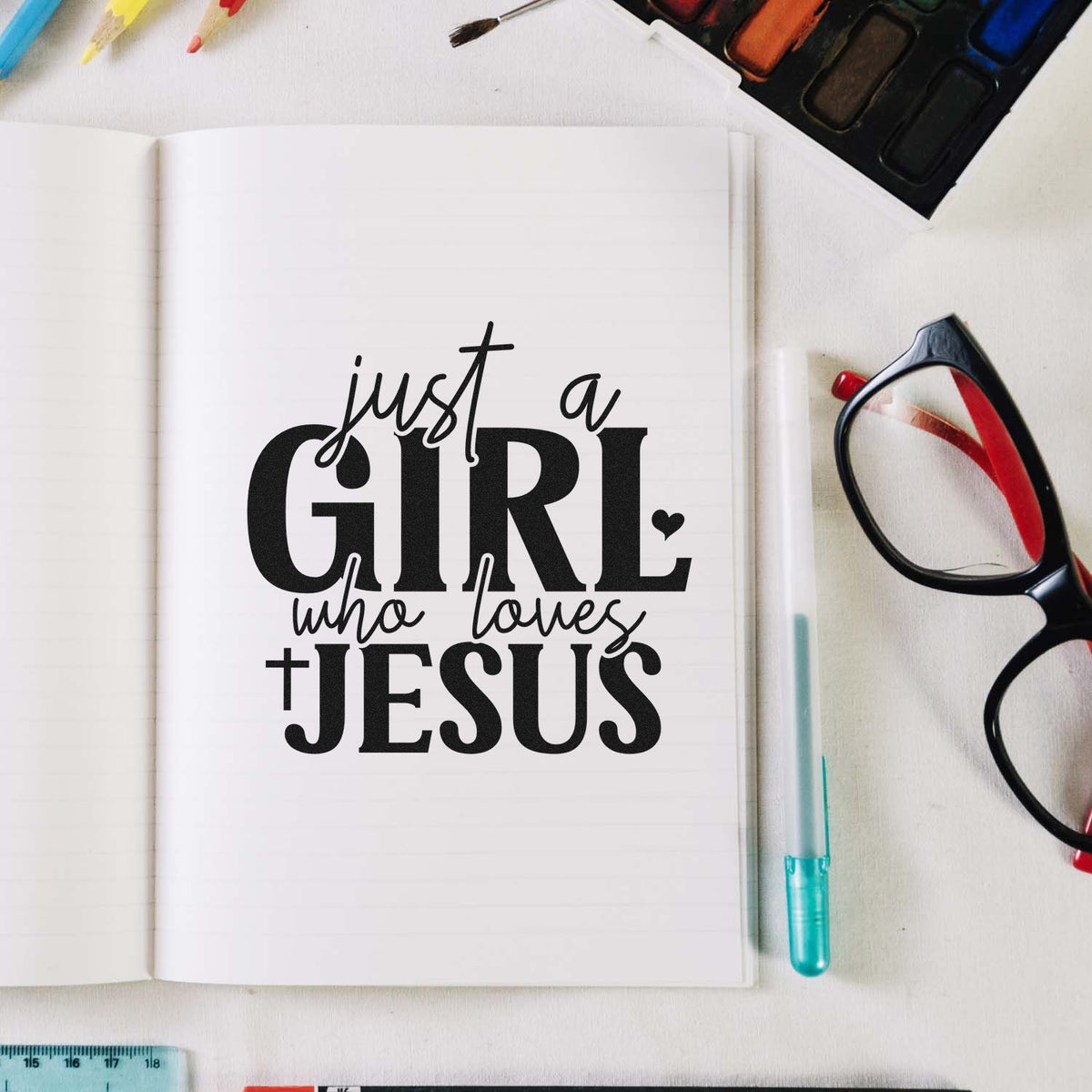 Inspirational rubber stamp design reading Just a Girl Who Loves Jesus for faith-based crafting and Bible journaling.