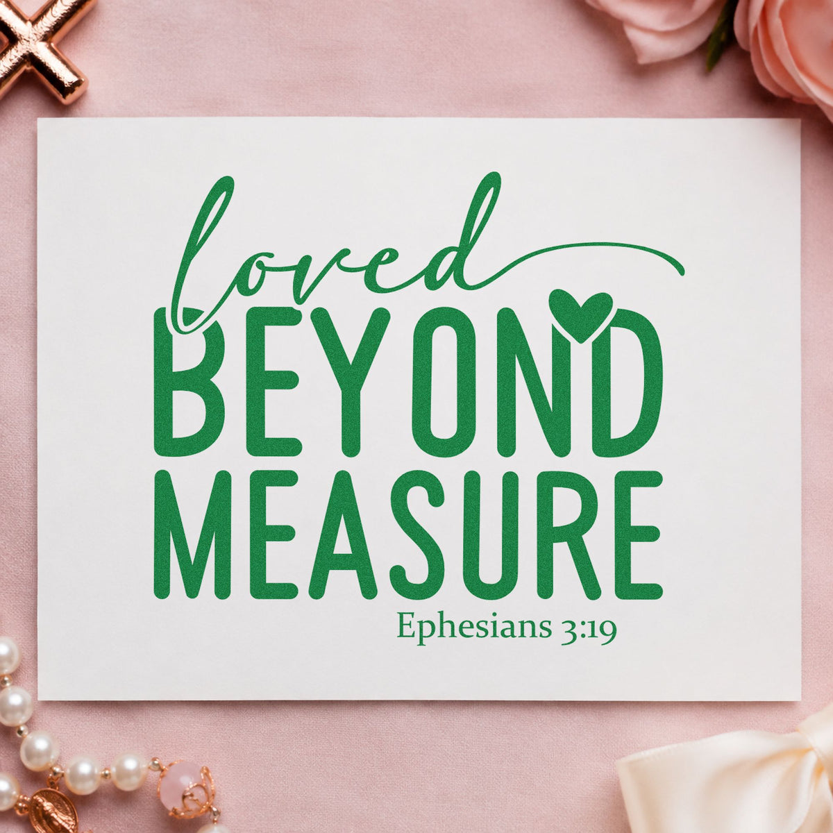 Loved Beyond Measure craft stamp imprint in green ink on a handmade project, one idea being framed nursery art.