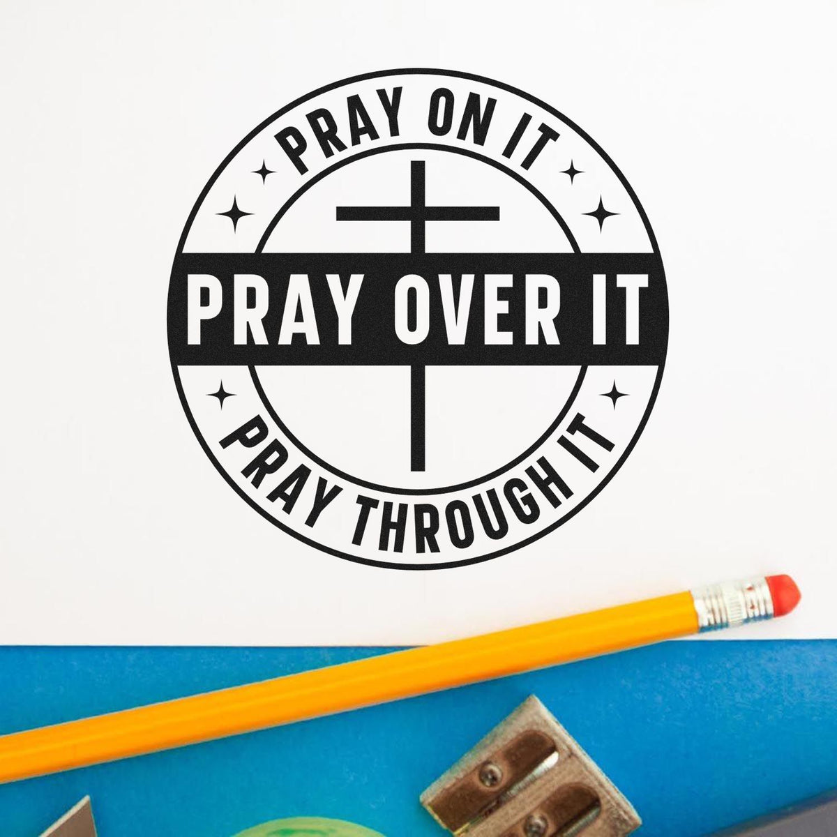 Christian rubber stamp design with cross and text: Pray on it, pray over it, pray through it.