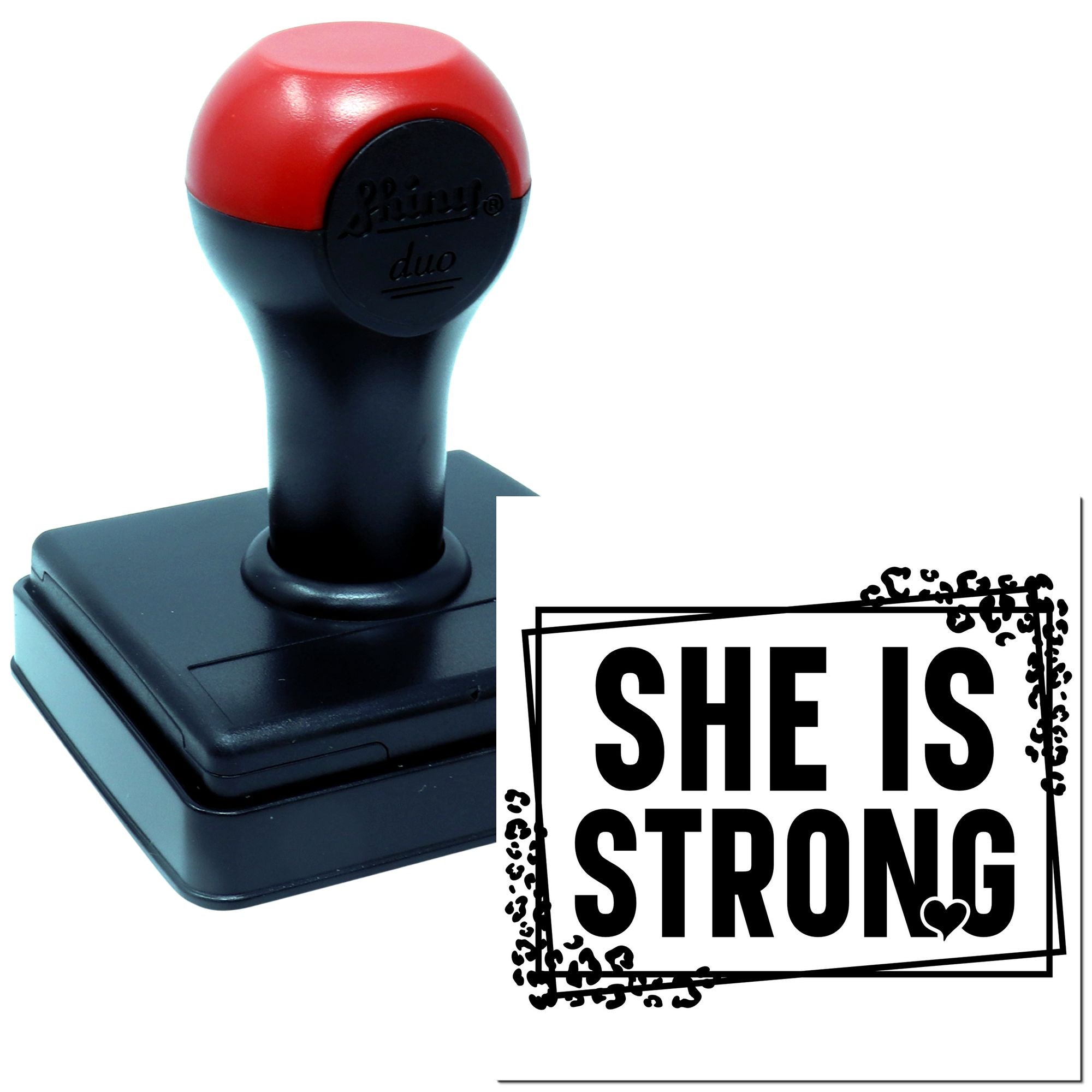 Self-inking rubber stamp with She Is Strong design for motivational cards, journals, and handmade paper crafts.