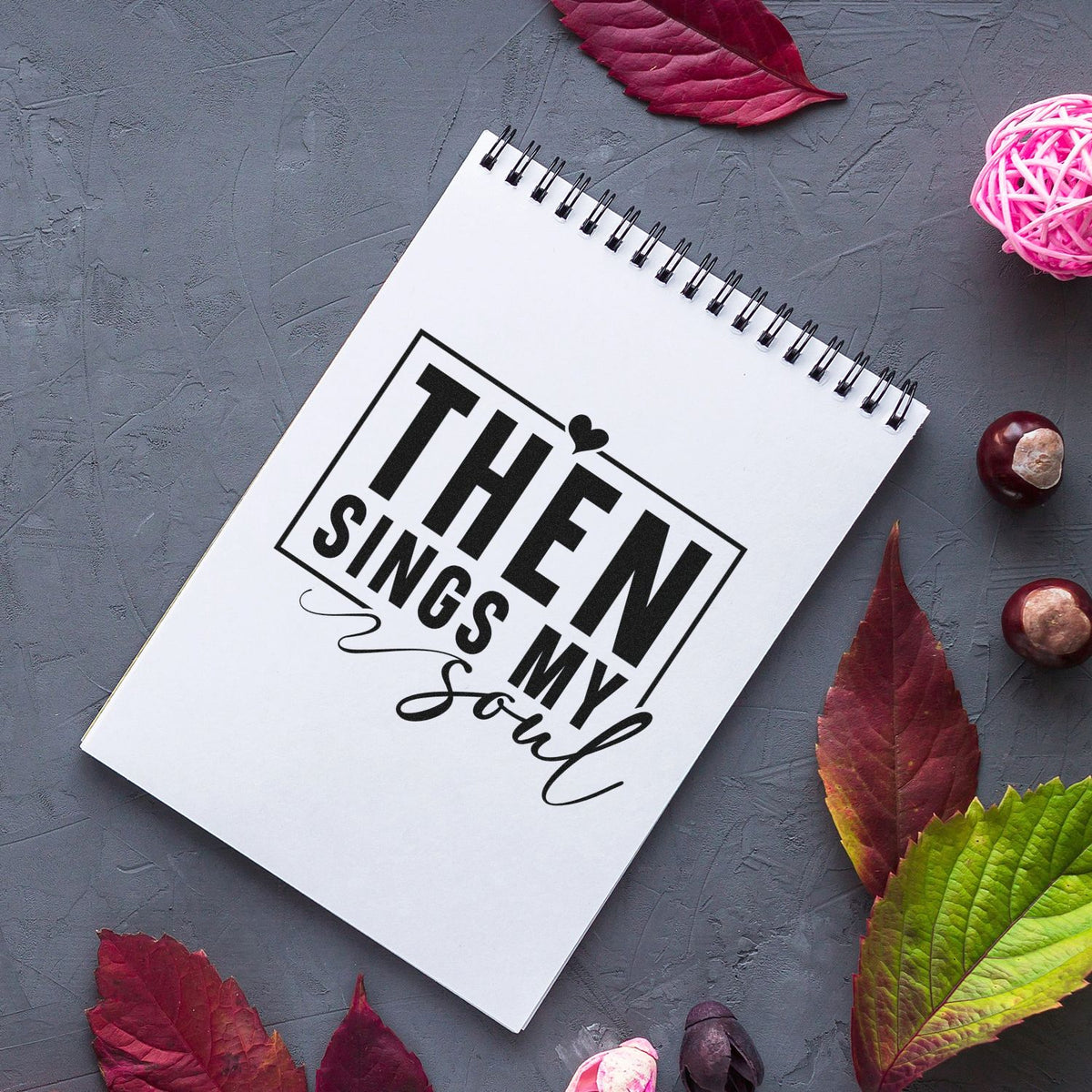 Personalized rubber stamp design reading Then Sings My Soul on a notebook, perfect for DIY paper crafts and wedding favors.