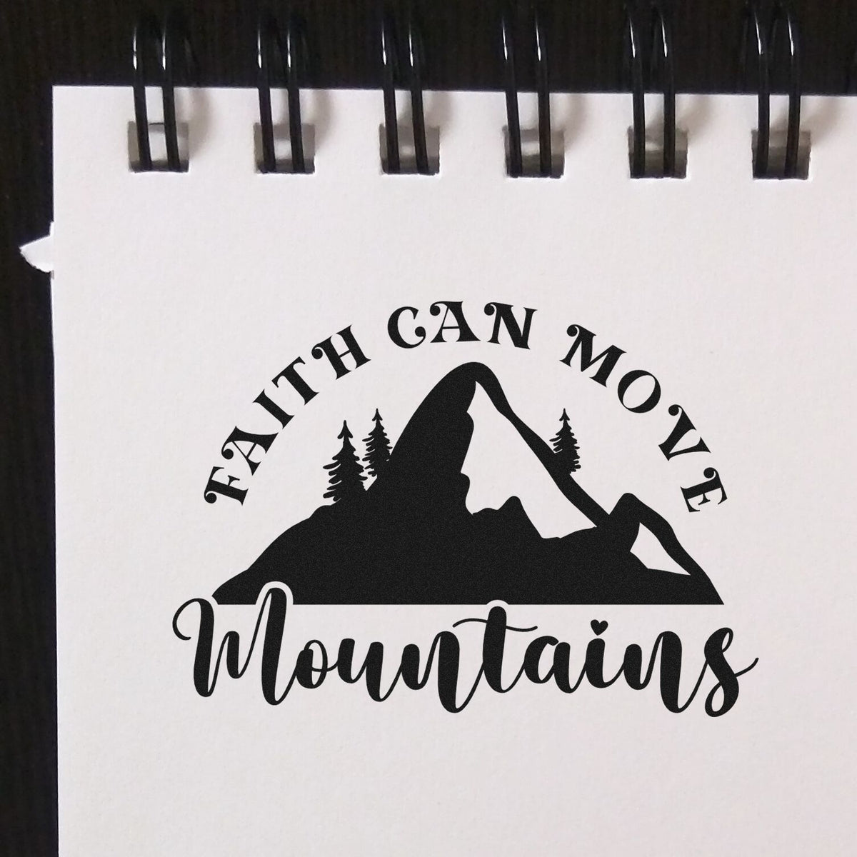Faith Can Move Mountains custom rubber stamp design with mountain silhouette for inspirational crafts and packaging.