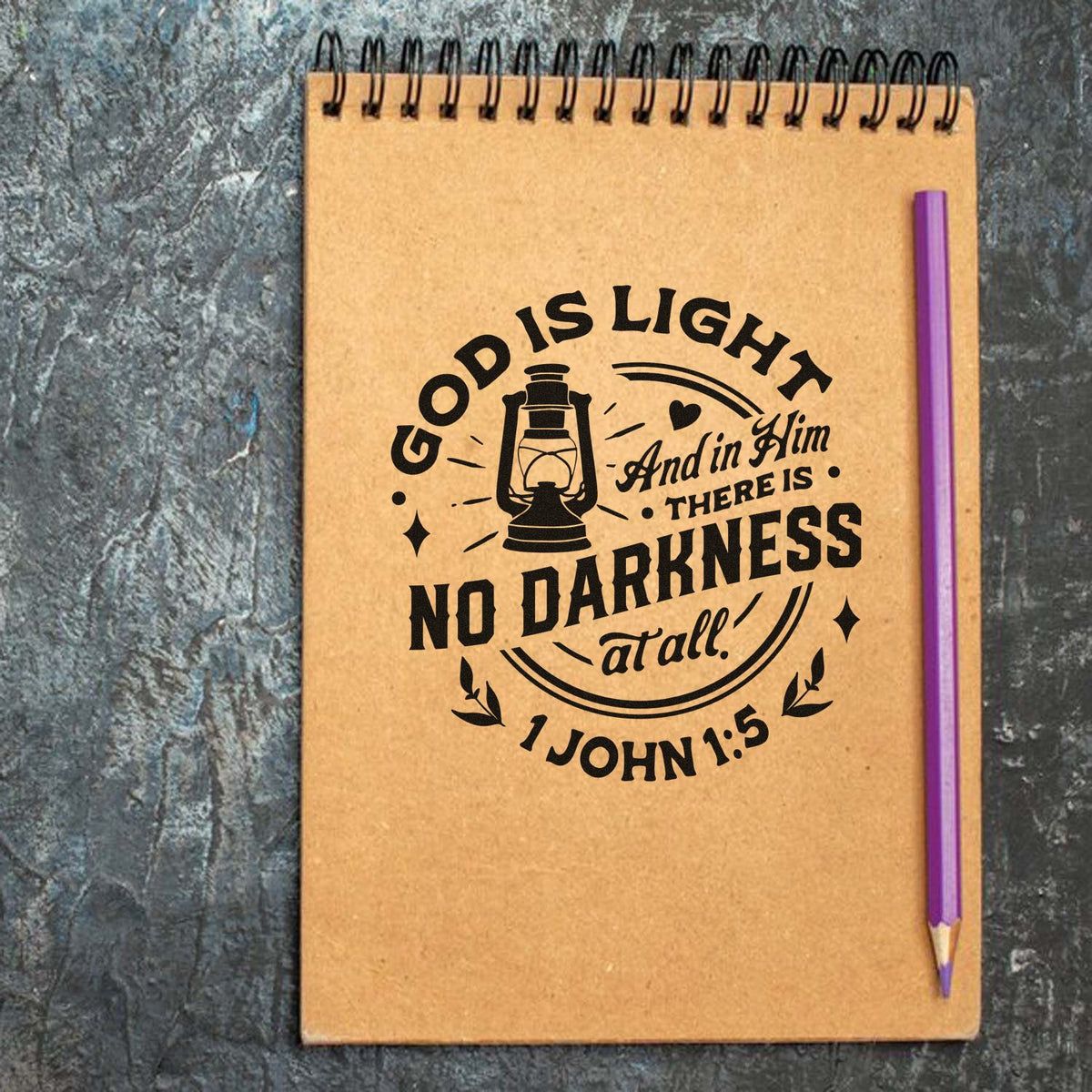 Christian rubber stamp design with lantern and John 1:5 verse, God is light and in Him there is no darkness at all.