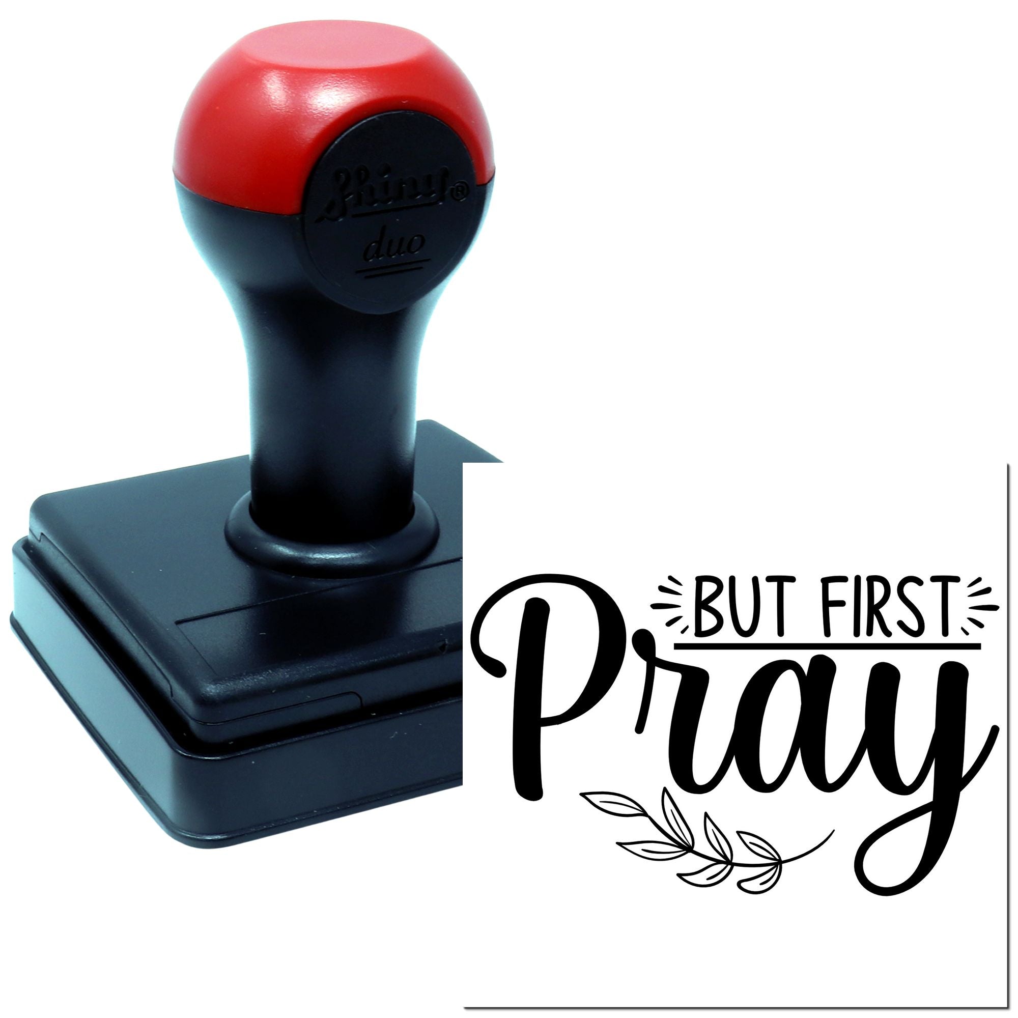 Self-inking rubber stamp with But First Pray faith quote design for Christian craft projects and custom stamping.