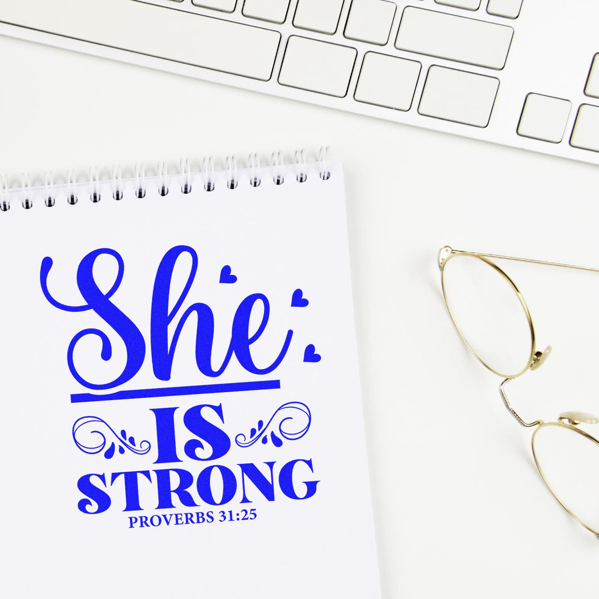She Is Strong Proverbs 31:25 rubber stamp design for Christian womens notebooks, planners, and faith-based gifts.