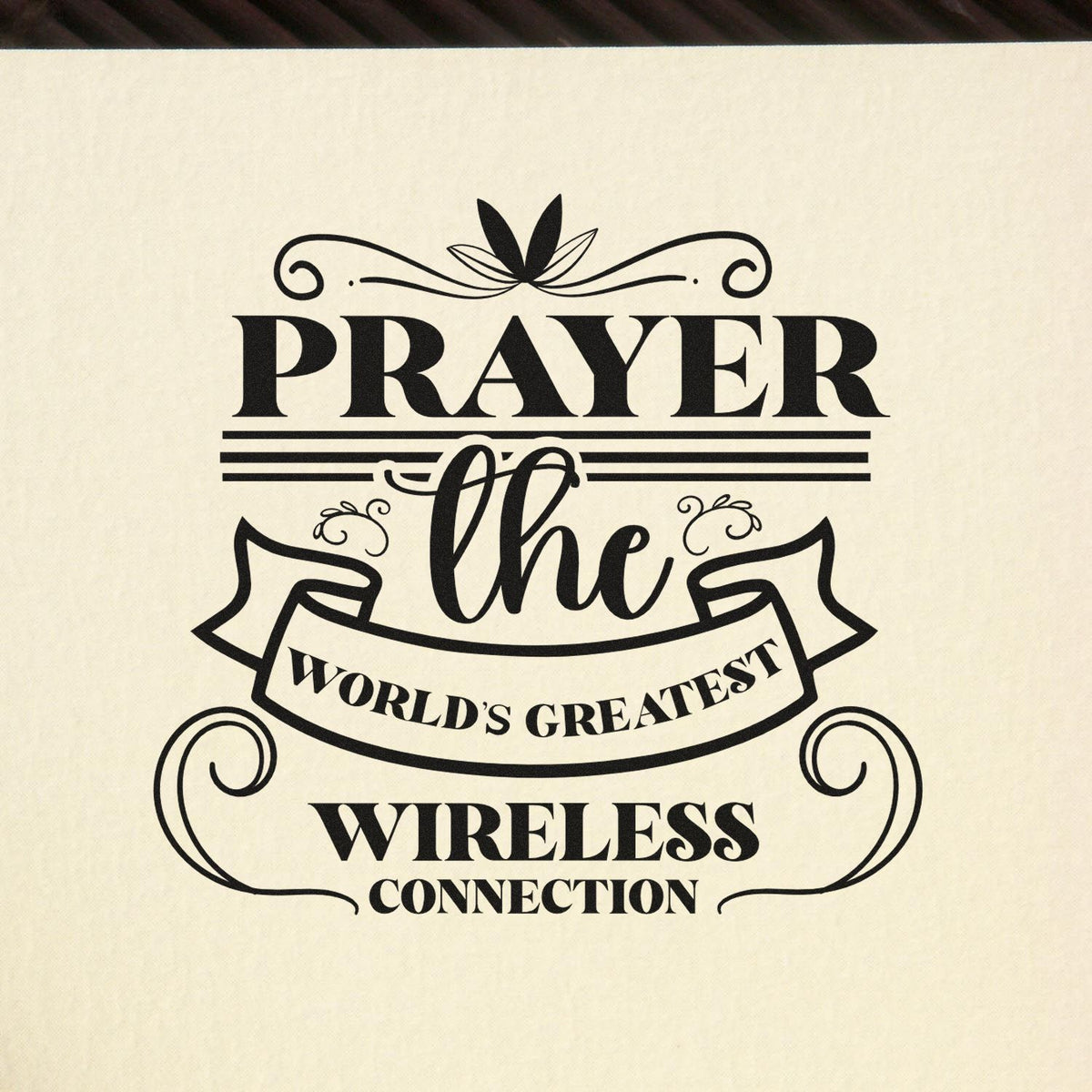 Vintage prayer rubber stamp design reading Prayer: the worlds greatest wireless connection in bold decorative typography.