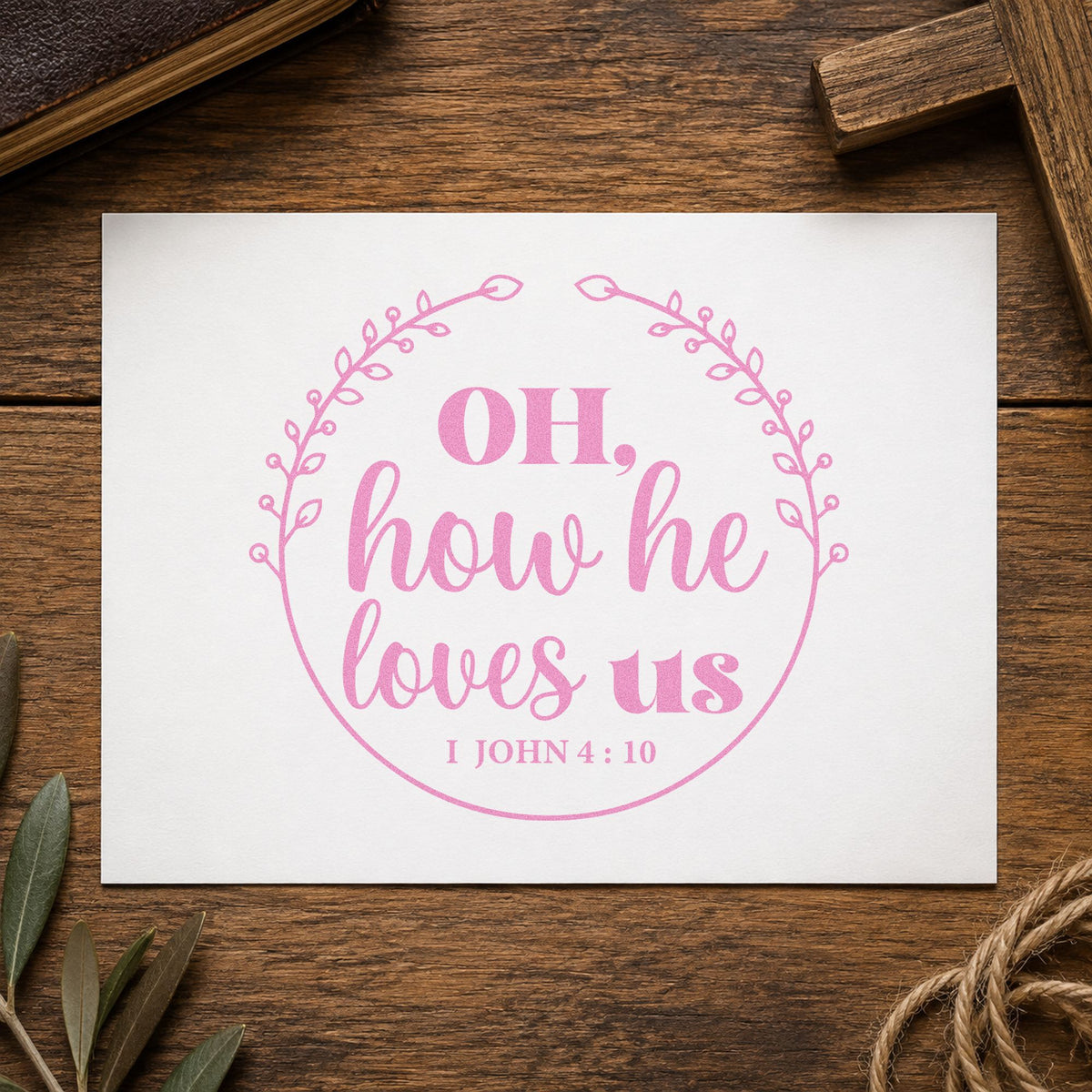 How He Loves Us Wreath craft stamp in purple ink on cardstock, an easy option for wedding favor tags.