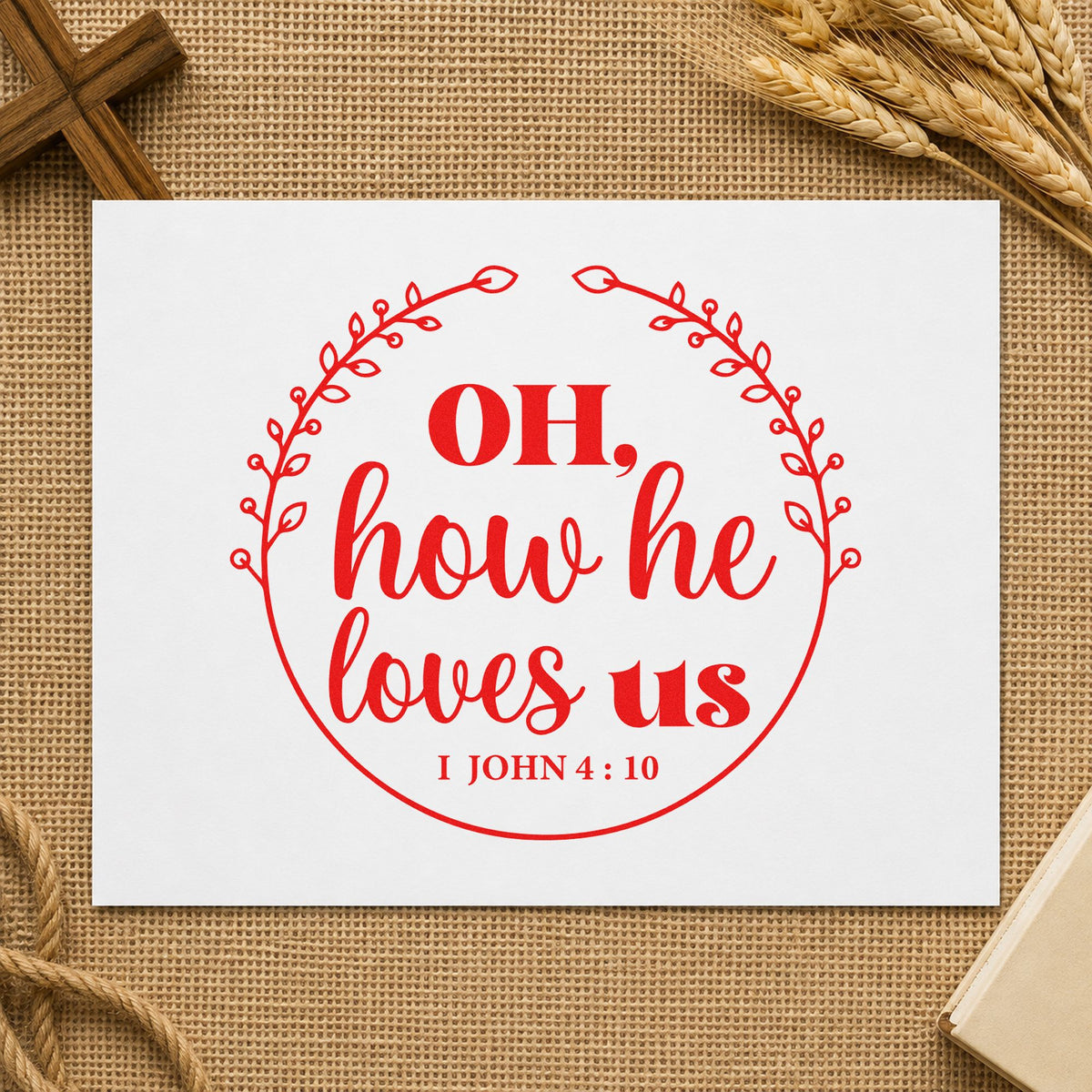 How He Loves Us Wreath rubber stamp shown in red ink, stamped for projects such as bookmark crafts.