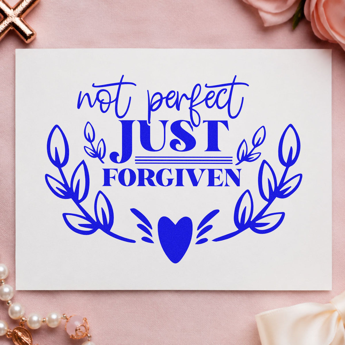 Not Perfect Just Forgiven Wreath craft stamp imprinted in blue ink on paper, a design suited to recovery group gifts.