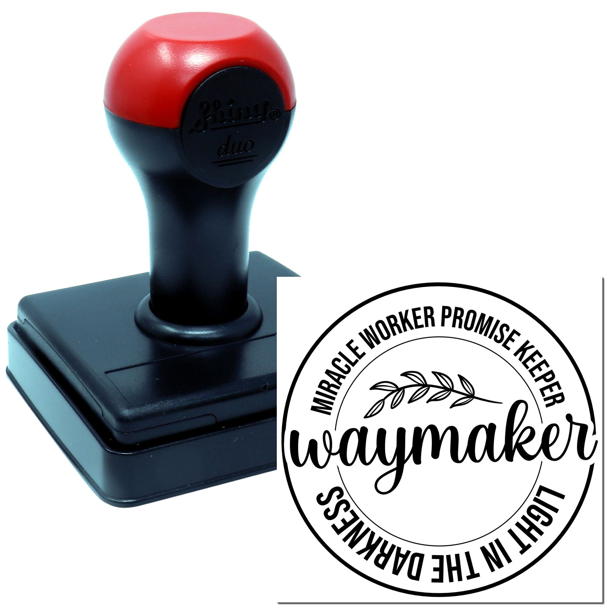 Self-inking rubber stamp showing a custom circular Waymaker, Miracle Worker, Promise Keeper, Light in the Darkness design.