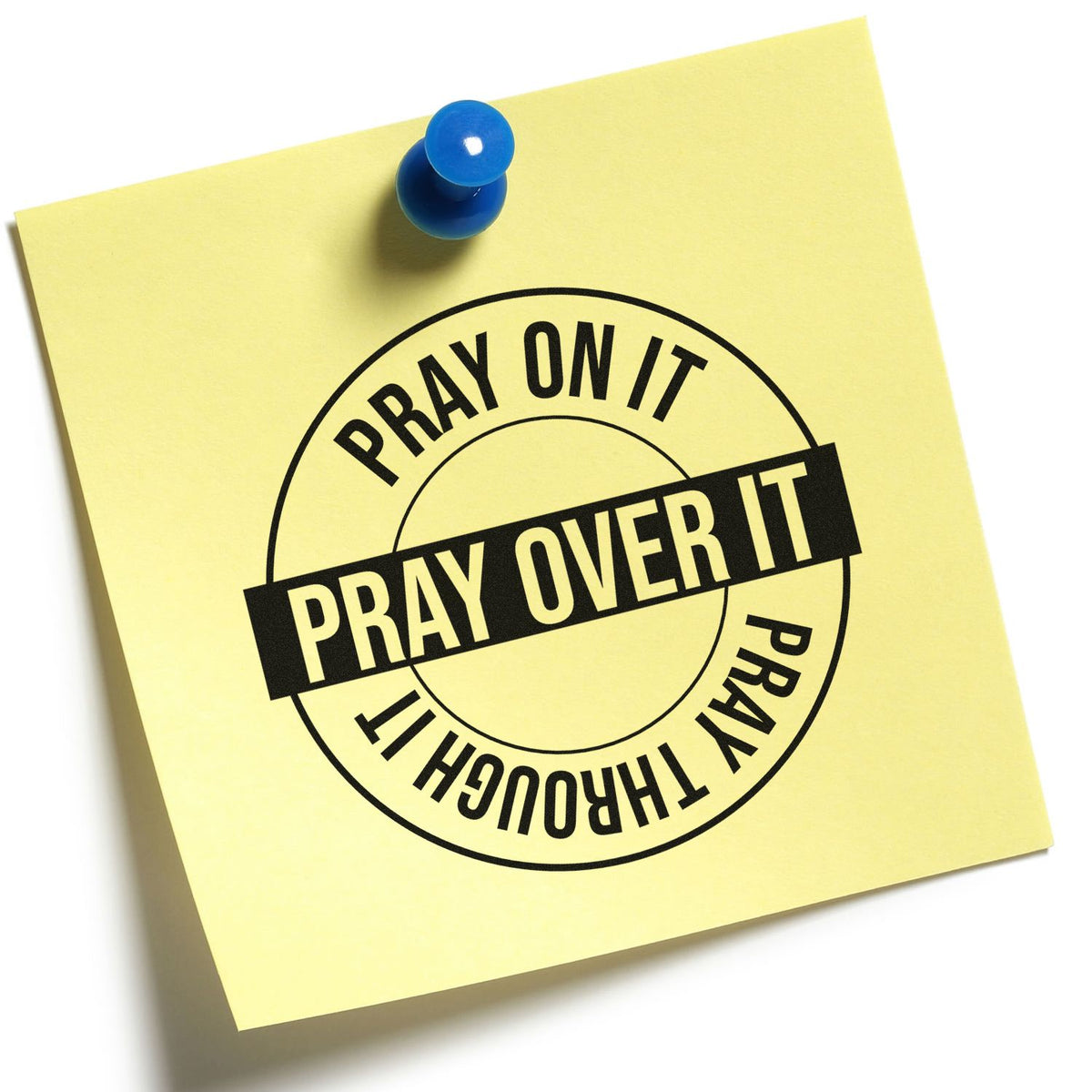 Christian rubber stamp design on yellow sticky note, reading Pray on it, pray over it, pray through it.
