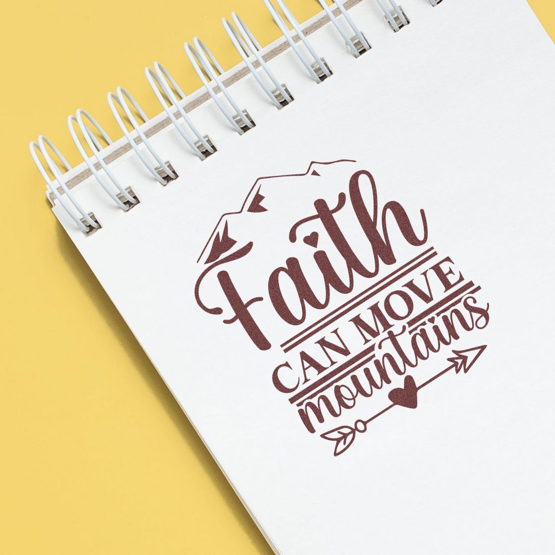 Faith can move mountains rubber stamp on spiral notebook for inspirational religious crafts, journaling, and stationery.