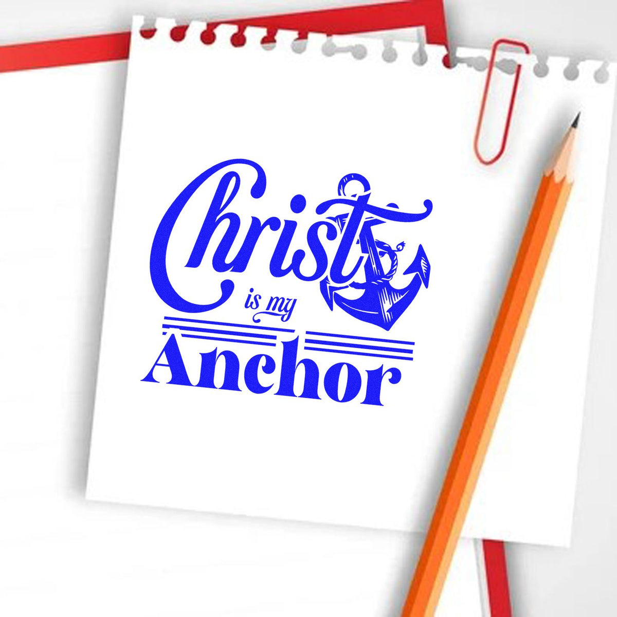 Christ is My Anchor blue nautical rubber stamp design on notebook paper, ideal for faith-based custom stamps and stationery.