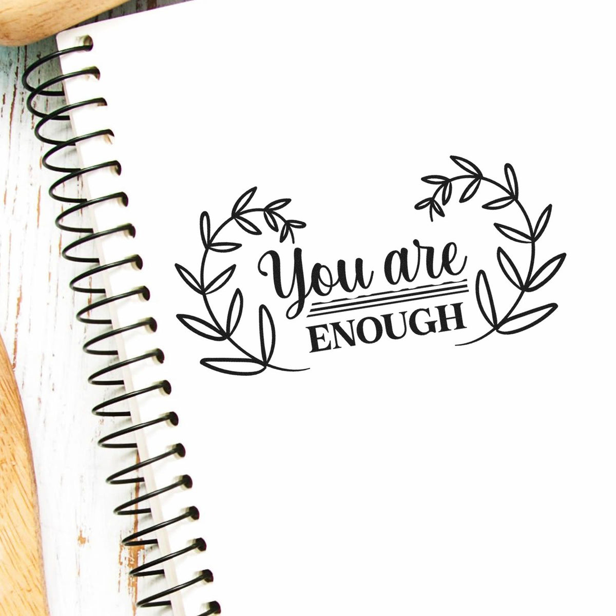 You Are Enough floral quote rubber stamp design on notebook, inspirational self-love stamp for journaling and crafting