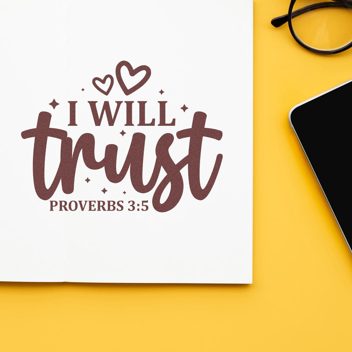 Faith-based rubber stamp design reading I will trust Proverbs 3:5 with hearts on a notebook cover.