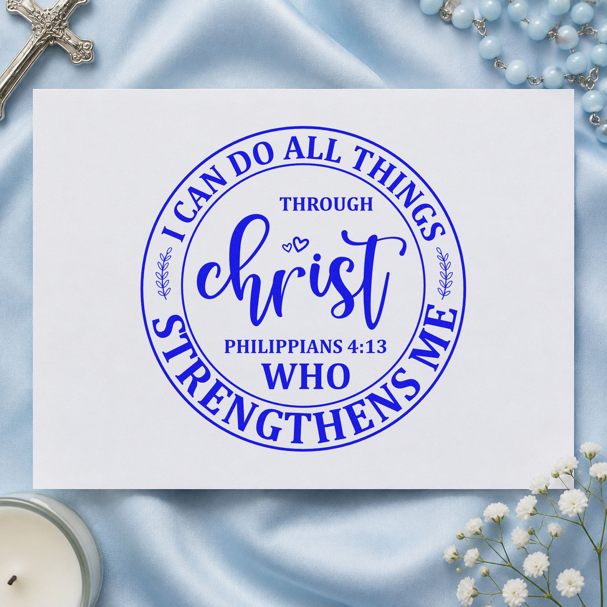 Christ Strengthens Me Circle craft stamp imprinted in blue ink on paper, a design suited to team tees.