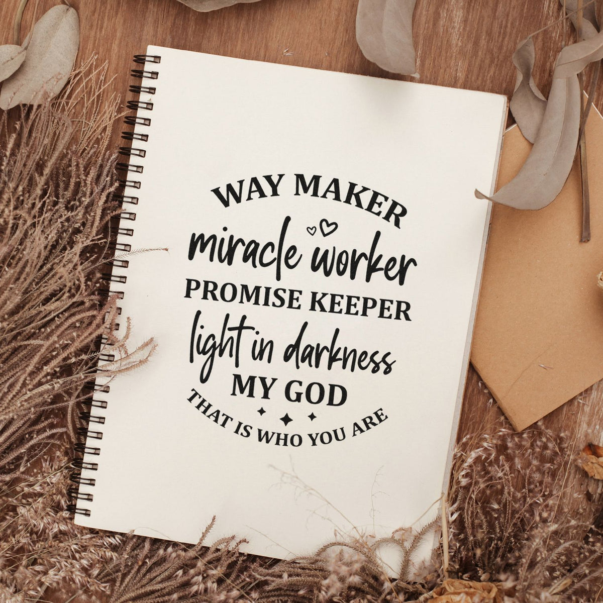 Way Maker miracle worker rubber stamp design on journal page with Christian quote, promise keeper and light in darkness text.