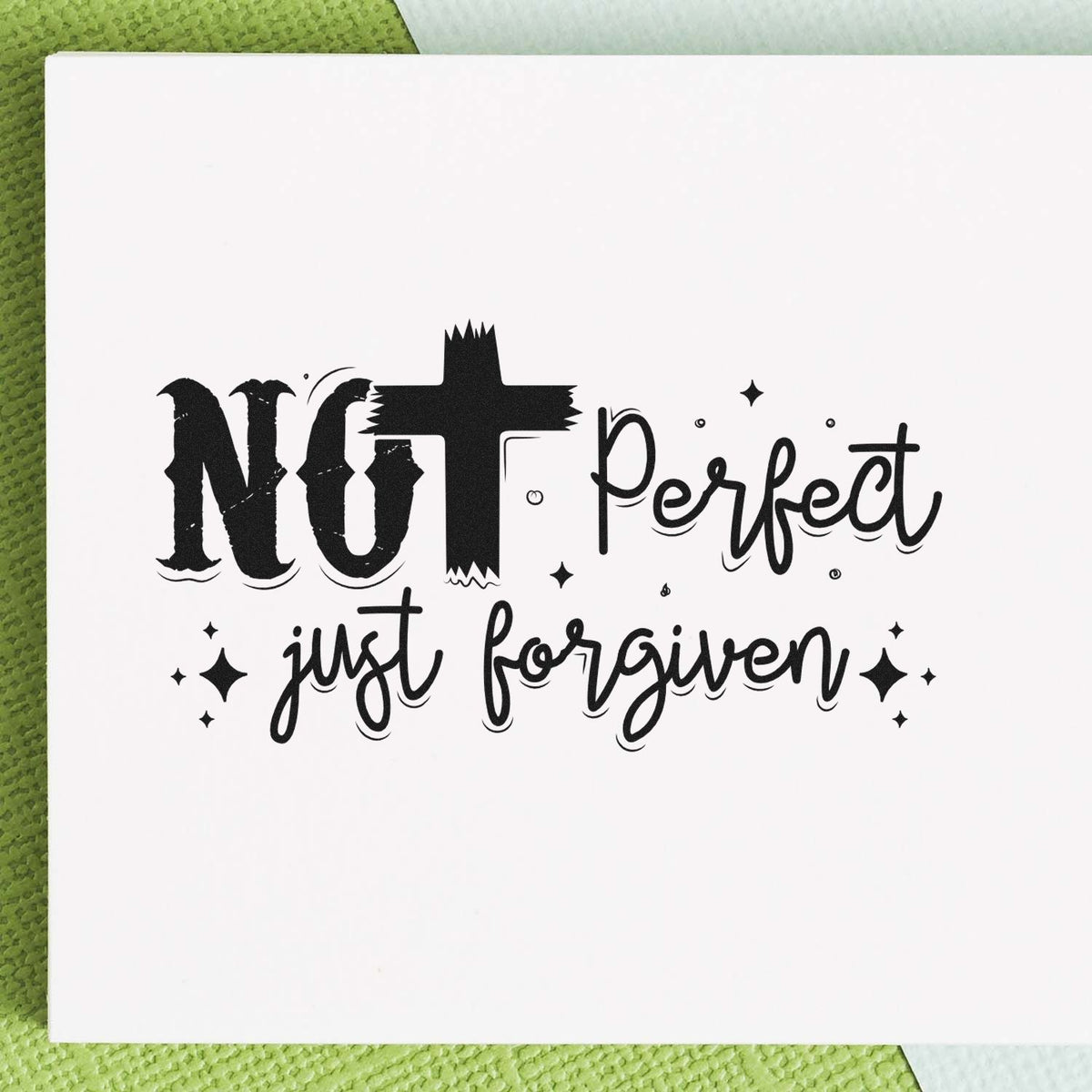 Christian rubber stamp reading Not Perfect, Just Forgiven for faith-based handmade cards and scrapbook projects.