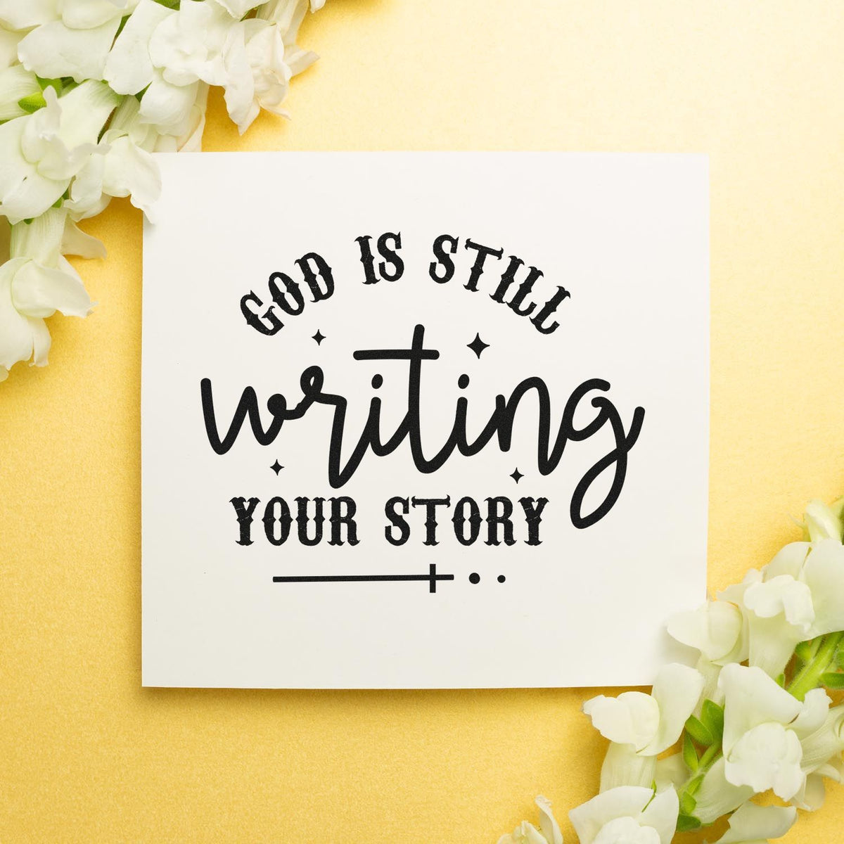 Christian rubber stamp design with God is still writing your story quote for scrapbooking, journaling, and faith crafts.
