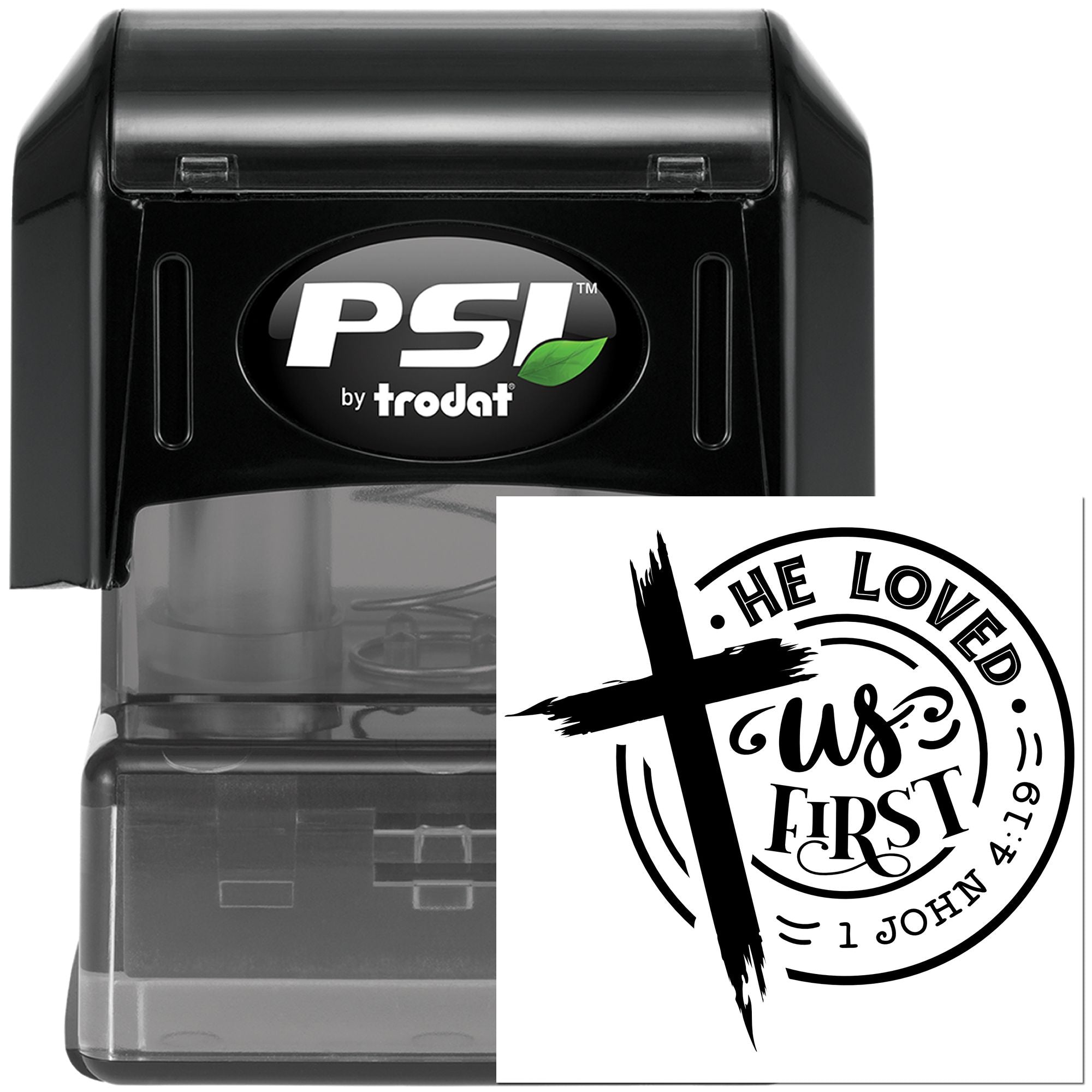 Self-inking Christian rubber stamp with cross and scripture, He Loved Us First 1 John 4:19.