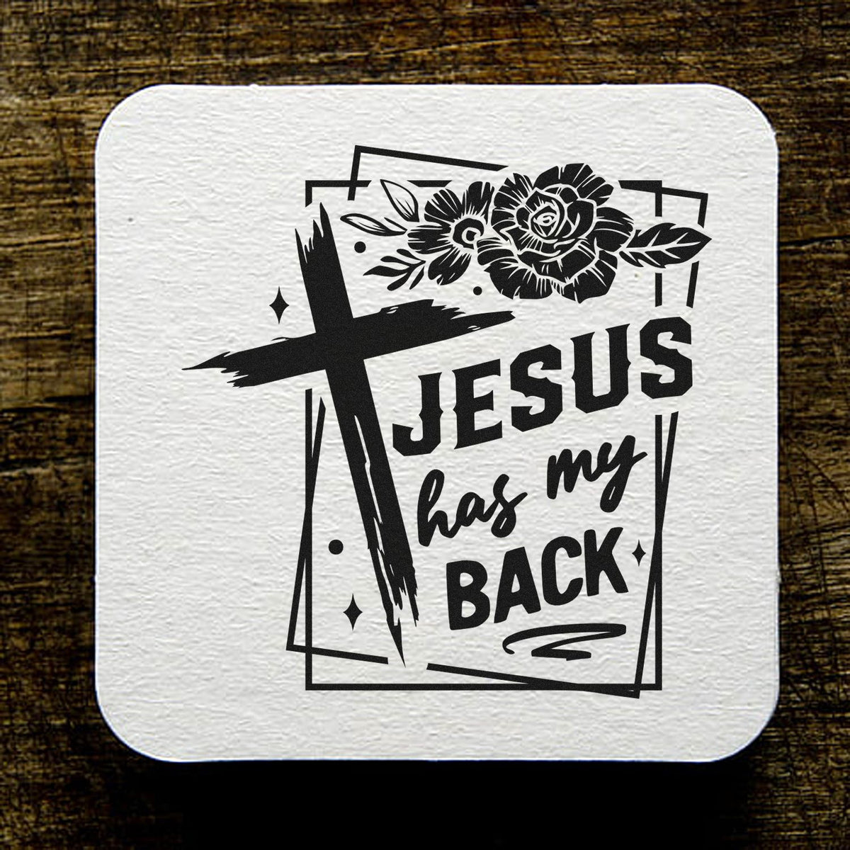 Christian rubber stamp design with cross and flowers reading Jesus has my back for faith-based crafts.