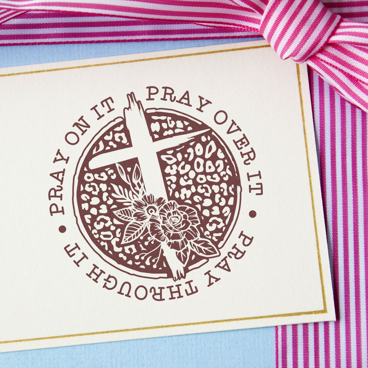 Christian rubber stamp design with floral cross and Pray On It, Pray Over It, Pray Through It sentiment on a gift card.