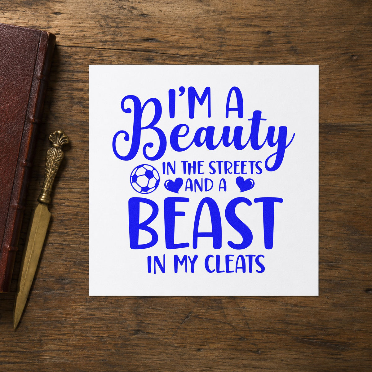 Beauty in Streets Beast in Cleats craft stamp in blue ink on cardstock, an easy option for hoodie sleeve panels.