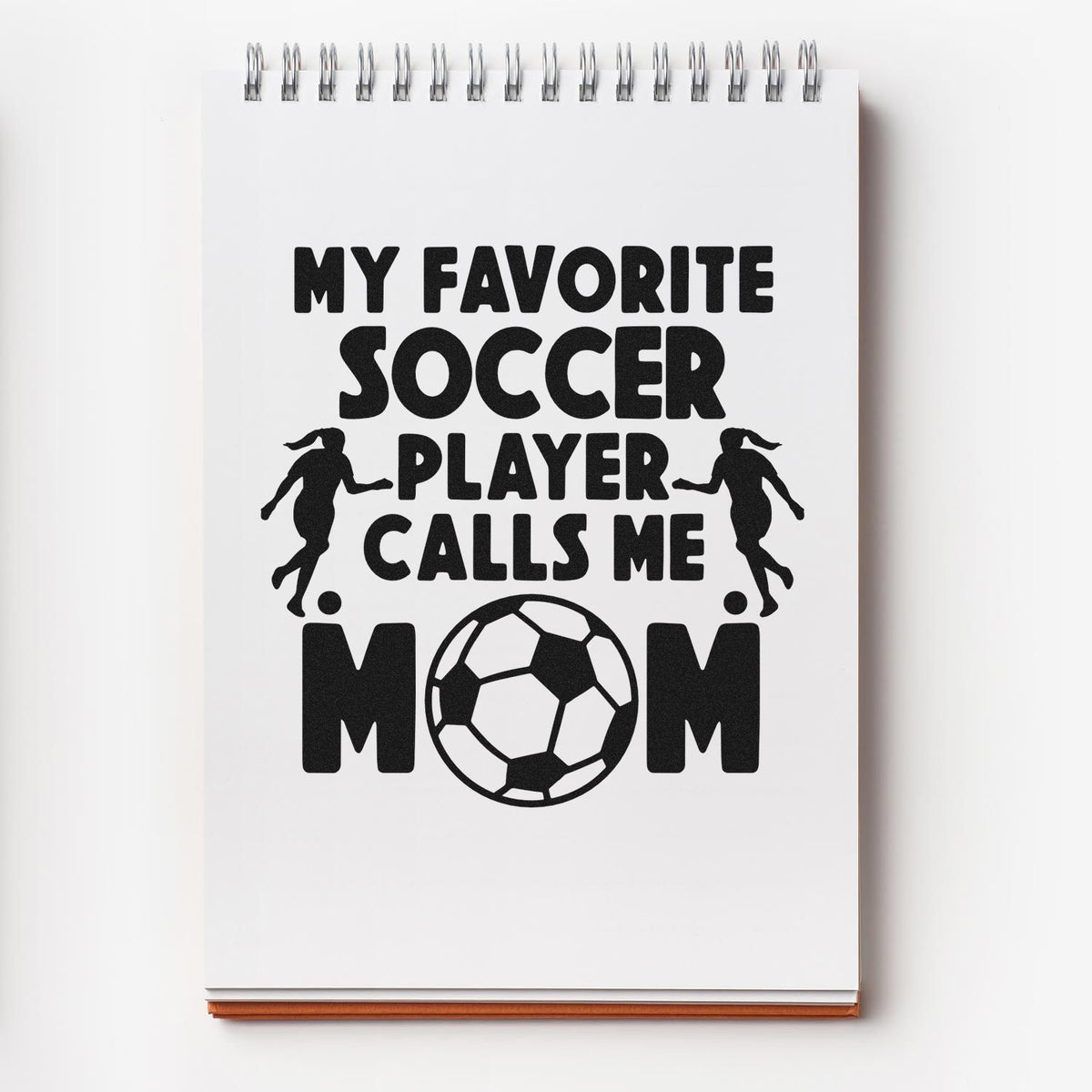 Soccer mom rubber stamp design with My Favorite Soccer Player Calls Me Mom text and soccer ball graphic.