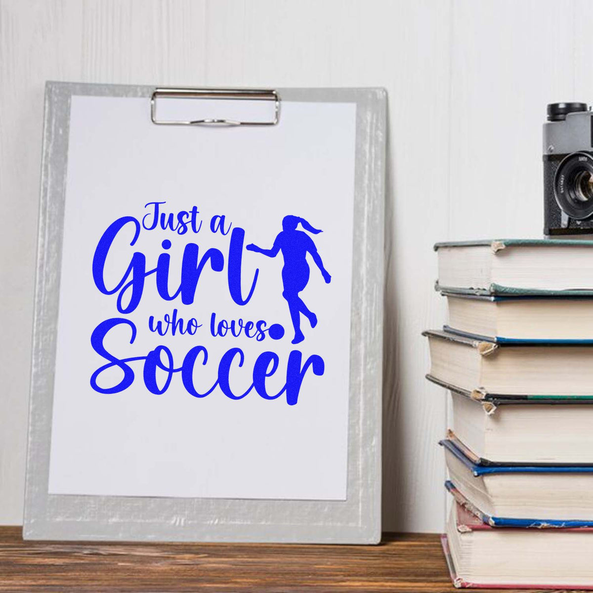 Girl Who Loves Soccer Silhouette rubber stamp shown in blue ink, stamped for projects such as club signing tags.