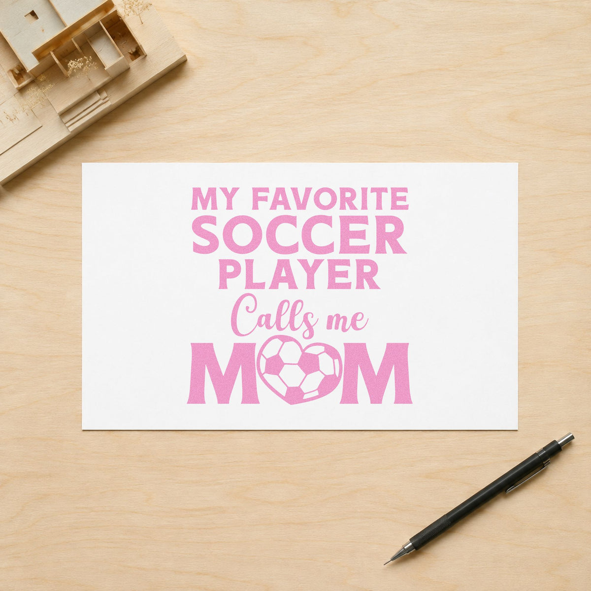 Favorite Soccer Player Calls Me Mom craft stamp in purple ink on cardstock, an easy option for team mom gift tags.