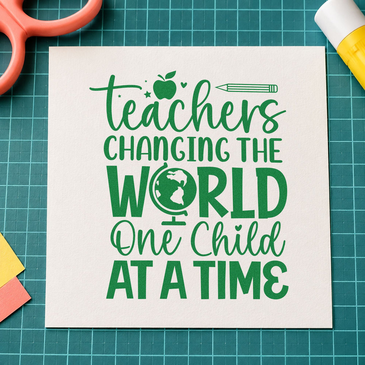 Teachers Changing the World craft stamp imprint in green ink on a handmade project, one idea being framed atlas wall.