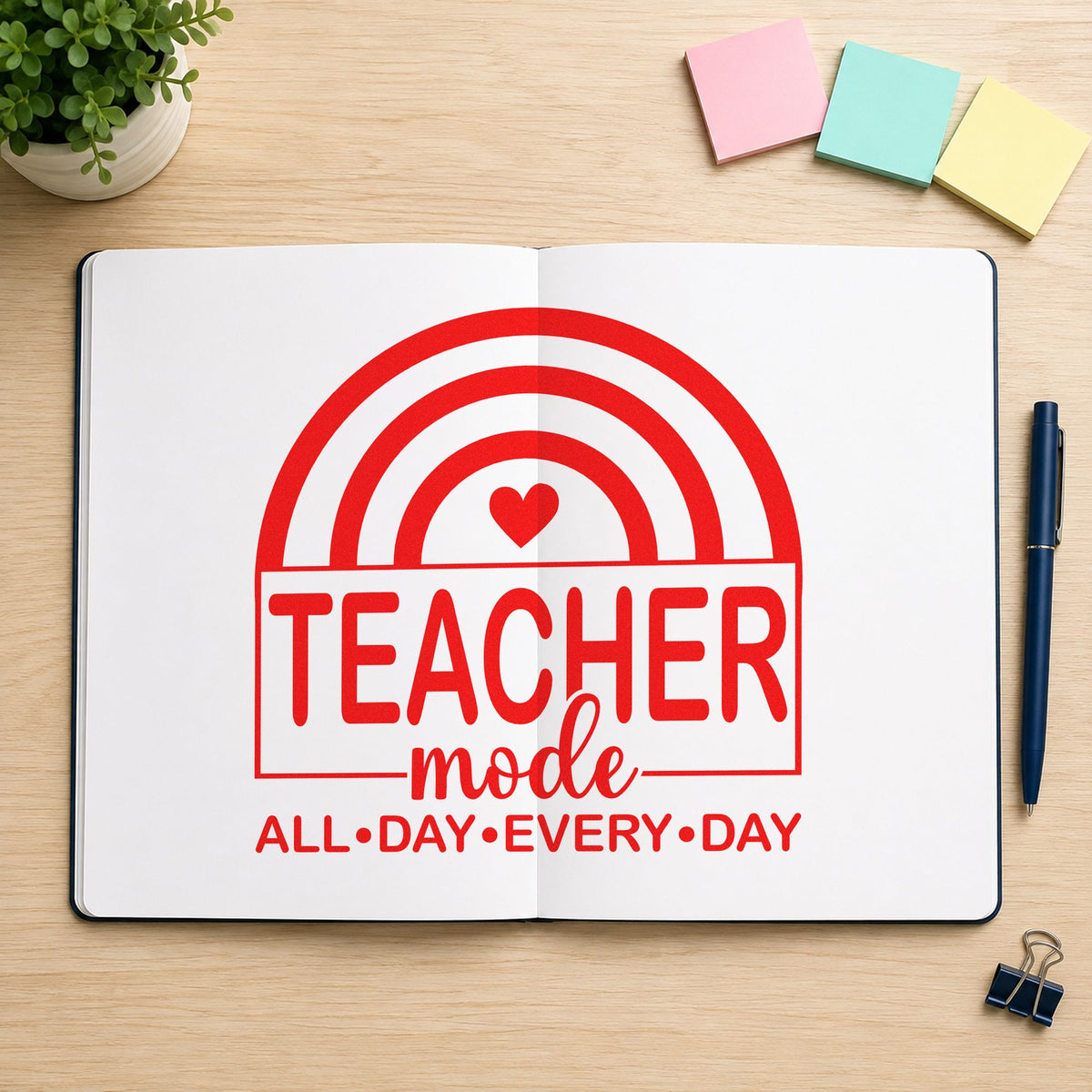 Teacher Mode Rainbow rubber stamp shown in red ink, stamped for projects such as long week notes.
