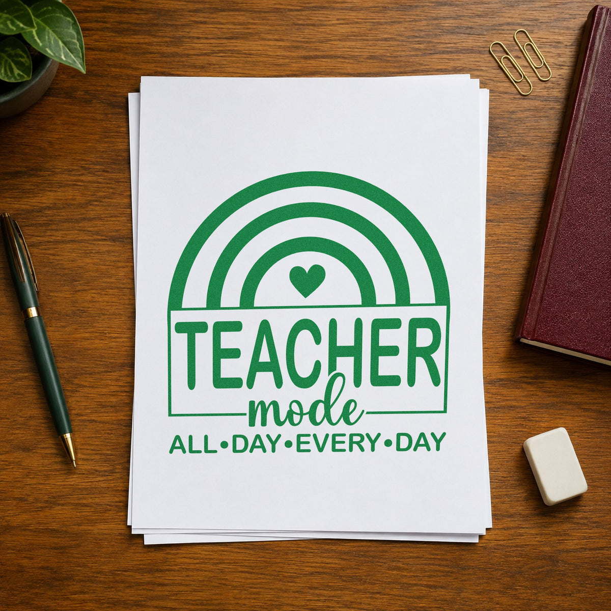 Teacher Mode Rainbow craft stamp imprint in green ink on a handmade project, one idea being framed entry hook.