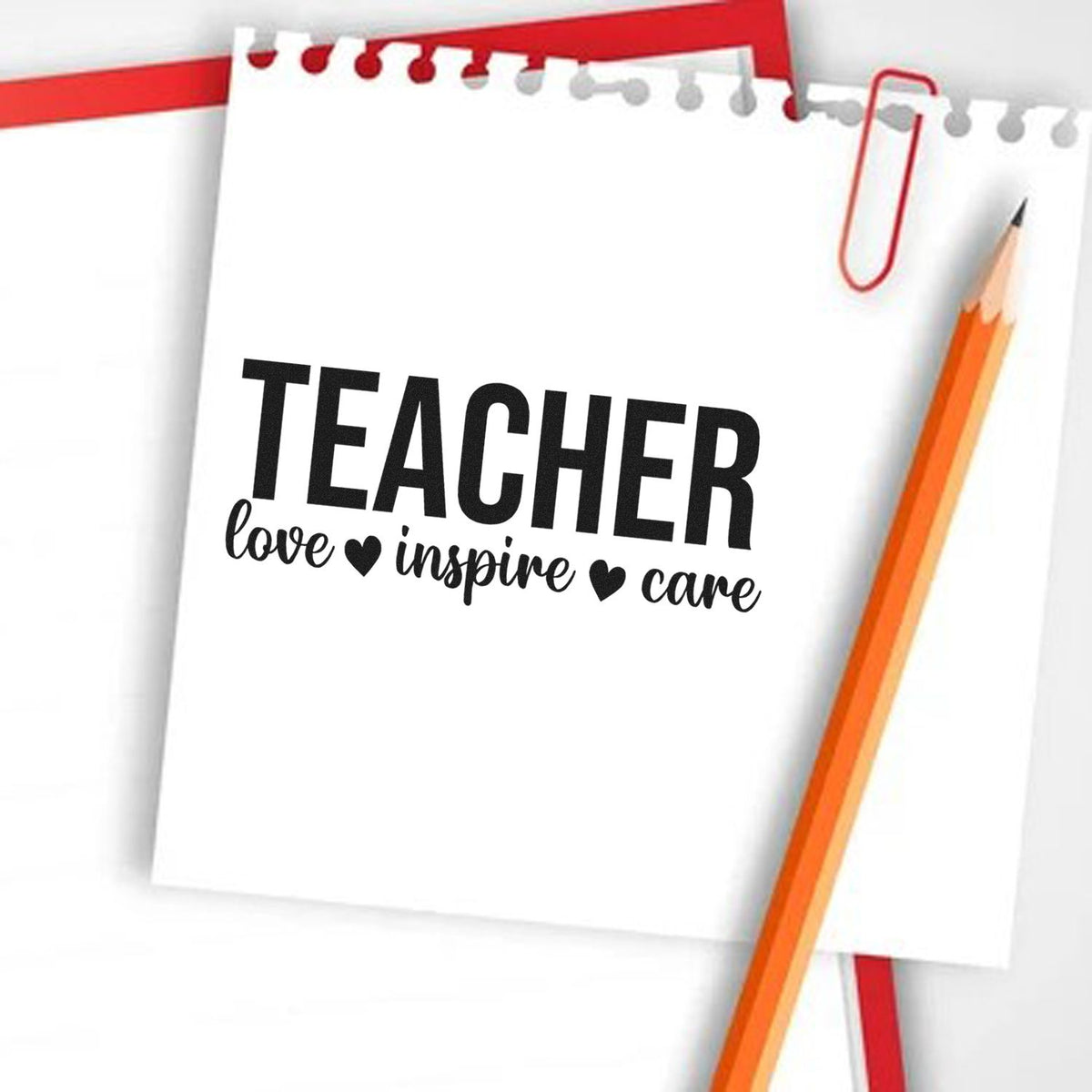 Teacher rubber stamp design with love inspire care on notebook paper, accented by pencil for classroom use.