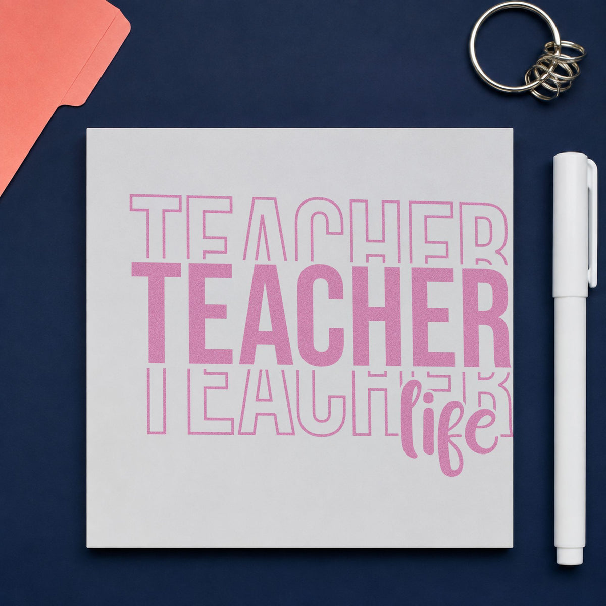 Teacher Life Outline Stack craft stamp in purple ink on cardstock, an easy option for merch hang tags.